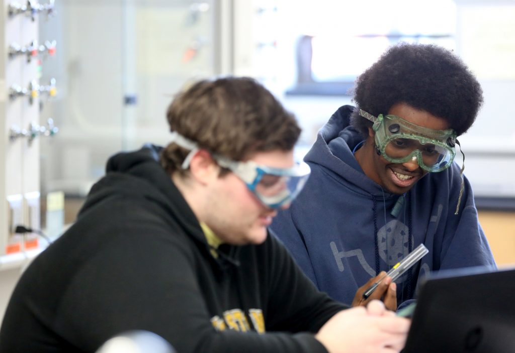 Students work in the lab during Associate Professor Matthew Ray's Chemistry of Materials class An engineering student works on mathematics coursework in Jarvis Hall Thursday, September 28, 2017. Pictured are students examining the products of a crystallization lab where they studied nucleation and growth of single crystalline materials and polycrystalline materials using saturated aqueous ionic solutions of alum, copper sulfate, magnesium sulfate, and iron ammonium sulfate. (UW-Stout Photo by Brett T. Roseman)